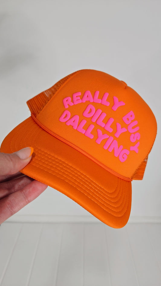 Orange Really Busy Dilly Dallying Trucker Hat "Brightyn"